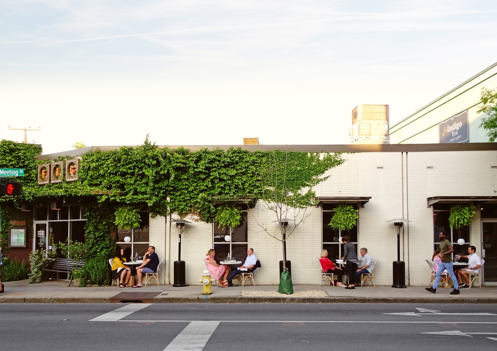 People dining outdoors at FIG Restaurant in Charleston, SC
